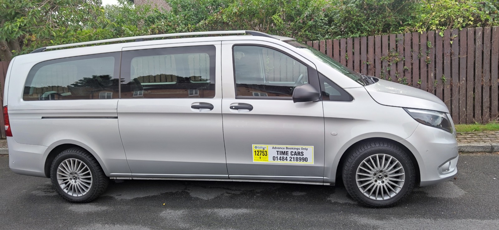 Silver Mercedes Vito minibus, side profile